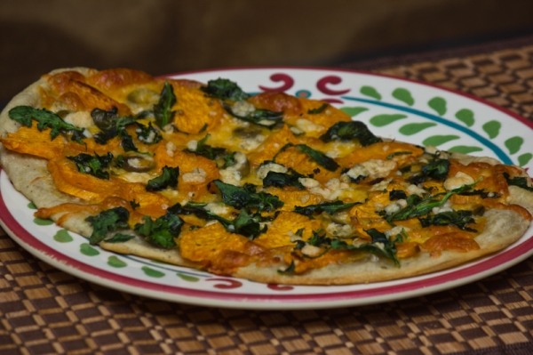 Sweet potato, olive, and spinach pizza